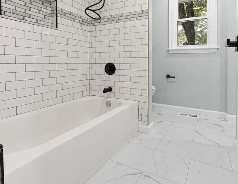 Updated bathroom with new tile and fixtures